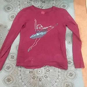 A kids long sleeved shirt